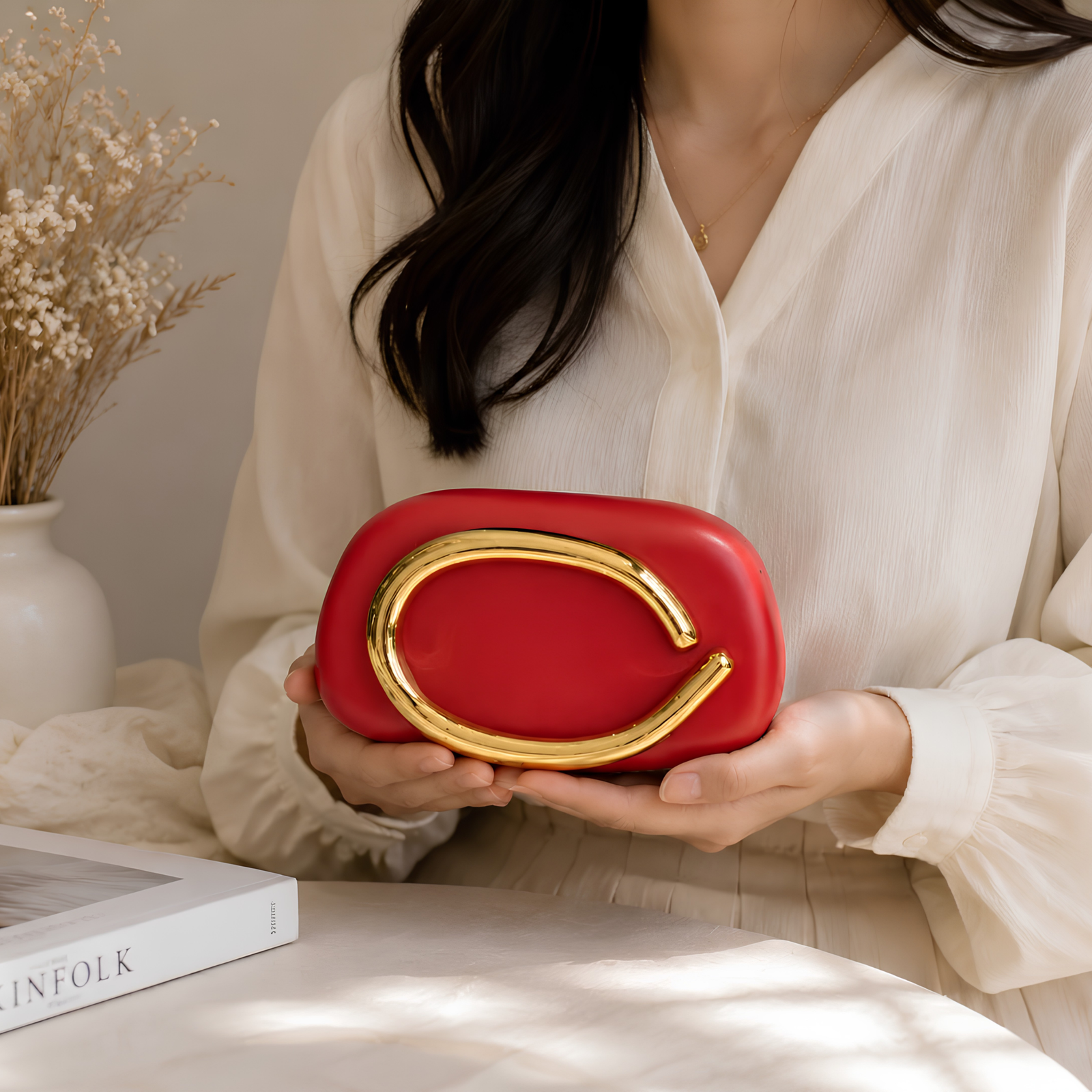 Red clutch bag